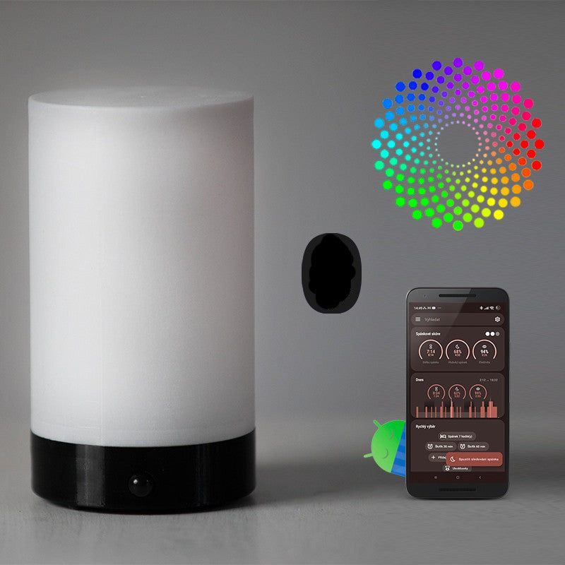 Sleep Phaser V3 next to a phone with the app that controls the lamp